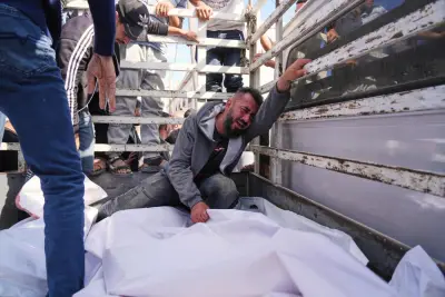 Israeli strikes kill at least 85 in Gaza as Israel allows more aid into Palestinian territory