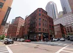 Maura Healey delivers millions to boost downtown Boston housing revival